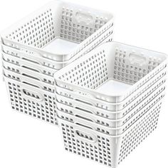 three white plastic baskets sitting next to each other