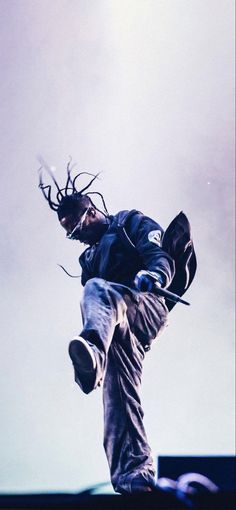 a skateboarder is doing a trick in the air