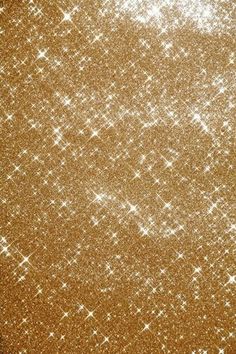 gold glitter texture background with white stars and sparkles on the edges, like snow flakes