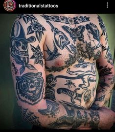 a man with lots of tattoos on his chest