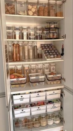 an organized pantry with lots of food and containers