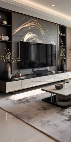 a modern living room with an entertainment center and coffee table in front of the tv