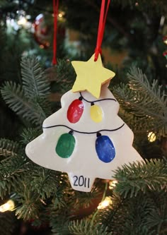 a christmas tree ornament hanging from the branches