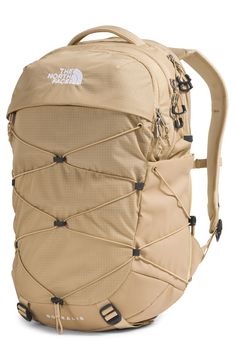 The FlexVent suspension system and padded back panel in this water-repellent backpack ensure lasting comfort whether you're on the trail or on campus. The convenient sternum strap offers added support, and the front bungee straps can secure a jacket. Two exterior side pockets provide handy storage for water bottles and small items, while the spacious main compartment is organized for your laptop, books and other daily essentials. Top carry handles; padded shoulder straps; sternum strap   FlexVen North Face Borealis Backpack, Borealis Backpack, The North Face Borealis, North Face Borealis, Bungee Cord, Tablet Sleeve, North Face Backpack, North Face Women, Mini Backpack