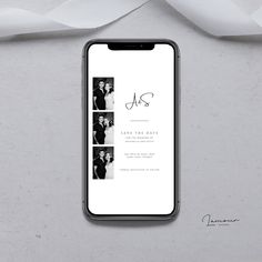 an iphone screen with the same photo on it, next to a white ribbon that says save the date