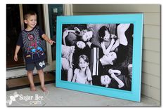 a young boy standing in front of a blue frame with black and white photos on it