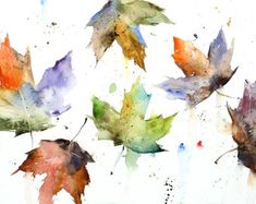 watercolor painting of colorful autumn leaves on white paper