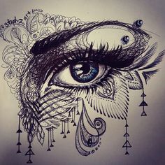 a drawing of an eye with feathers on it