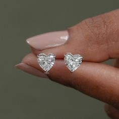 14K Solid Gold Heart Cut Lab Grown Diamond Earrings / 0.50 to 5.00 TCW Lab Diamond Stud Earrings / Screw Back Earrings For Women / Heart Shaped Diamond Solitaire Earrings / Bridesmaid Gift / Earrings for Your Love / Handmade Fine Jewelry ✥ SKU No.: IBE0099 ✥ 𝐌𝐚𝐢𝐧 𝐒𝐭𝐨𝐧𝐞 𝐃𝐞𝐭𝐚𝐢𝐥𝐬: ➻ Shape: Heart ➻ Weight:  0.50 TCW 1.00 TCW 1.50 TCW 2.00 TCW 2.50 TCW 3.00 TCW 3.50 TCW 4.00 TCW 4.50 TCW 5.00 TCW ➻ Color-Clarity: EF-VS ➻ Type: Lab Grown Diamond (CVD/HPHT) ➻ Certification: IGI Certific Diamond Solitaire Earrings, Bridesmaid Gifts Earrings, Solitaire Earrings, Handmade Fine Jewelry, Heart Shaped Diamond, Man Made Diamonds, Matching Jewelry, Wedding Jewelry Earrings, Screw Back Earrings