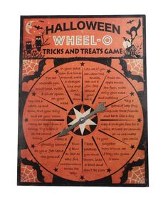 an orange and black halloween wheel - o game