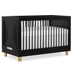 a small black crib with white sheets and wooden legs, on a white background