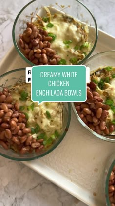 three glass bowls filled with food on top of a white tray