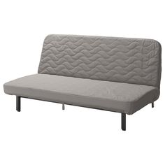 a gray couch sitting on top of a metal frame