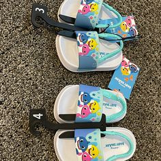 Baby Shark Sandals Unisex Size 3 & 4 Baby Cute Non-slip Flip Flops For Swimming, Playful Non-slip Sandals For Vacation, Synthetic Slide Sandals For Playtime, Cute Blue Sandals For Vacation, Cute Non-slip Blue Flip Flops, Playful Non-slip Multicolor Sandals, Playful Blue Adjustable Sandals, Cute Blue Flip Flops For Vacation, Cute Blue Non-slip Flip Flops