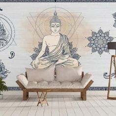 a living room with a couch, table and wall mural