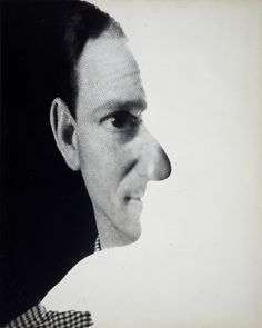 a black and white photo of a man's face