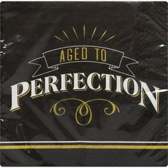 a black paper napkin with the words, aged to perfectionion on it and gold trimming