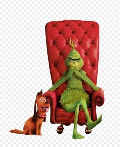 the grinch sitting in a red chair with his dog