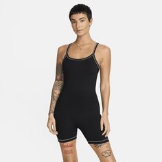 Up for a workout or down to chill—this bodysuit is ready for whatever you are. Its midweight, peachy-soft fabric stretches with your every move and dries quickly.﻿ Whether you layer up or wear it solo, it gives you a head-to-toe look you can feel comfortable and confident in all day long. Bodysuit Black, Women Lifestyle, A Workout, Black Bodysuit, Contrast Stitch, Nike Dri Fit, Workout Shorts, Polyester Spandex, Soft Fabric