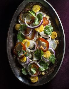 a pan filled with food on top of a table