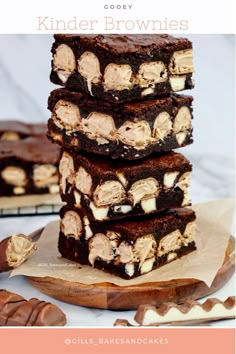 three brownies stacked on top of each other with peanut butter and chocolate in the middle