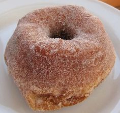 a donut sitting on top of a white plate