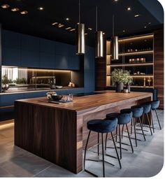 an image of a modern kitchen setting with bar stools and countertop area in the center