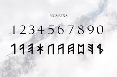 the numbers are written in black on a white background with mountains and clouds behind them