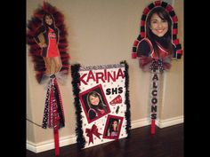 some decorations are hanging on the wall in front of a woman's face and other items