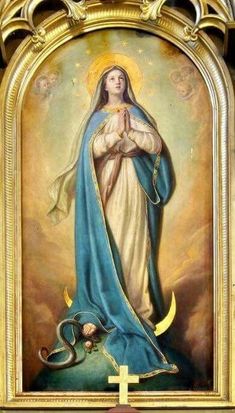 an ornate painting of the virgin mary in gold and blue with a snake on it