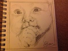 a drawing of a child's face is shown