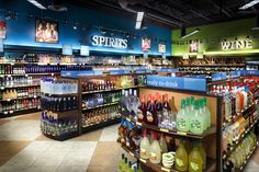 a store filled with lots of bottles of wine