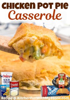 the chicken pot pie casserole is being held up by a wooden spatula