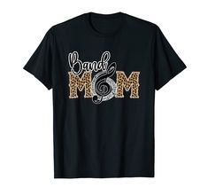 PRICES MAY VARY. Are you a Proud Band Mom? Support your favorite band player son or daughter with this cute musical Band Mom graphic design. This leopard cheetah design is great for marching bands, concerts, rehearsals, festivals, special events where your child performs. Super cute women's Band Mom graphic featuring trendy leopard print and cheetah print M varsity style letters. The "O" is a musical note treble clef graphic and the word band in a trendy script font. Lightweight, Classic fit, Do Cheetah Design, Marching Bands, Style Letters, Mom Support, Band Mom, April Fool's Day, Varsity Style, Musical Band, Crafts Party