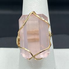 This Is A Beautiful Natural 26 Carat Rose Quartz 14k Wire Wrapped Handmade Ring Size 8.5. The Rose Quartz On This Ring Is Approximately 26 Carats And It Measures Approximately 23x15 Mm. The Wire On This Ring Is 10/20 Gold Filled Wire, Which Will Never Tarnish Or Change Colors. Rose Quartz Is Known As The Crystal Of Unconditional Love. It’s Said To Boost Feelings Of Self-Love And Foster Loving Relationships With Others. This Ring Would Be A Great Gift For A Jewelry Lover. This Ring Is One Of A Kind. Formal Faceted Rose Gold Rings, Loving Relationships, Relationships Love, Unconditional Love, The Rose, Jewelry Lover, Womens Jewelry Rings, Handmade Ring, Wire Wrapped