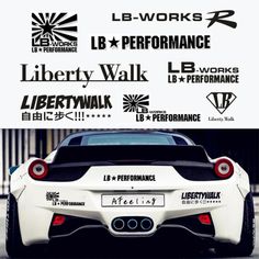 the back end of a white sports car with black and white decals on it