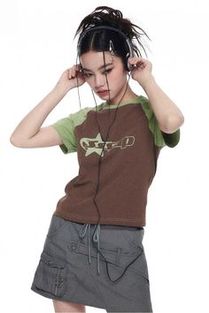 a young woman with headphones on her ears