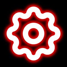 a red and white circular object on a black background with the light reflecting off it's center