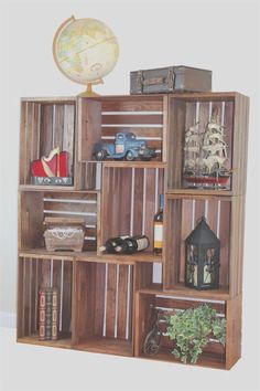 a wooden shelf filled with lots of different items