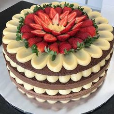 a chocolate cake with strawberries on top