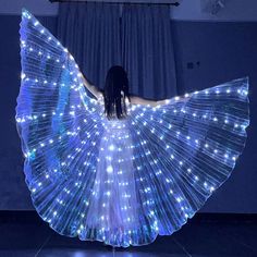 Light up the night with our Illuminated Elegance LED Wings, an ethereal addition to any festival or performance attire. These wings offer a stunning display of brilliant lights, designed to mimic the gentle flutter of a butterfly in flight. Perfect for creating a mesmerizing spectacle as you move to the music or simply make an entrance that no one will forget. Steady or Flashing Height: 57'' (145 cm) Battery not included (3x AA) Material: Plastic Smart Lighting Ideas, Ambient Bedroom, Breath Of Heaven, Fan Dancing, Ocean Queen, Light Up Costumes, Fete Saint Patrick, Glow Party Supplies, Led Dance