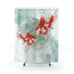 a shower curtain with two goldfishs in the water and stars on it's side