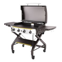 an outdoor grill on wheels with the lid open to show it's cooking area