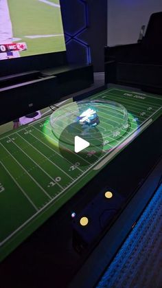 an interactive football game is being played on the tv