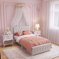 a bedroom with pink walls and white furniture