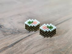 the earrings are made out of small beads