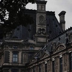 an old building with a clock tower on top