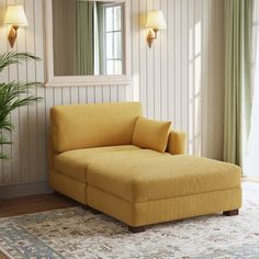 a yellow chaise lounge chair in front of a mirror