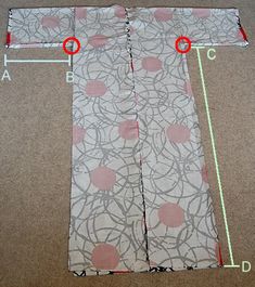 the pattern is cut out and ready to be sewn on with two red circles