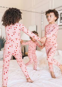 Do you love to cozy up with your little ones in the evening? Then you will fall head over heels for these super soft pajamas. With a variety of different prints, your cute babies will be ready for bed before they even know it! Content + Care 95% Bamboo, 5% Spandex Machine wash cold Questions about fit and sizing? Email us at hello@loocsy.com Christmas Pj Photoshoot, Christmas Pajamas Photoshoot, Baby Christmas Pajamas, Pink Candy Cane, Grinch Pajamas, Pajamas For Kids, Pink Pjs, Toddler Stuff, Pajama Pattern